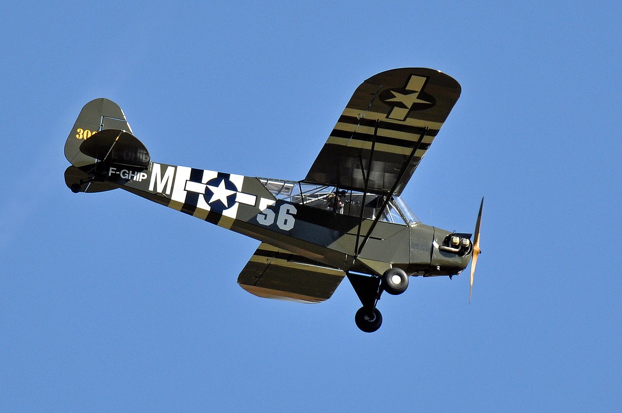 The story of the Piper L-4H Grasshopper crew that used their Colt. 45 Pistols to shoot down a Fieseler Fi 156 Storch