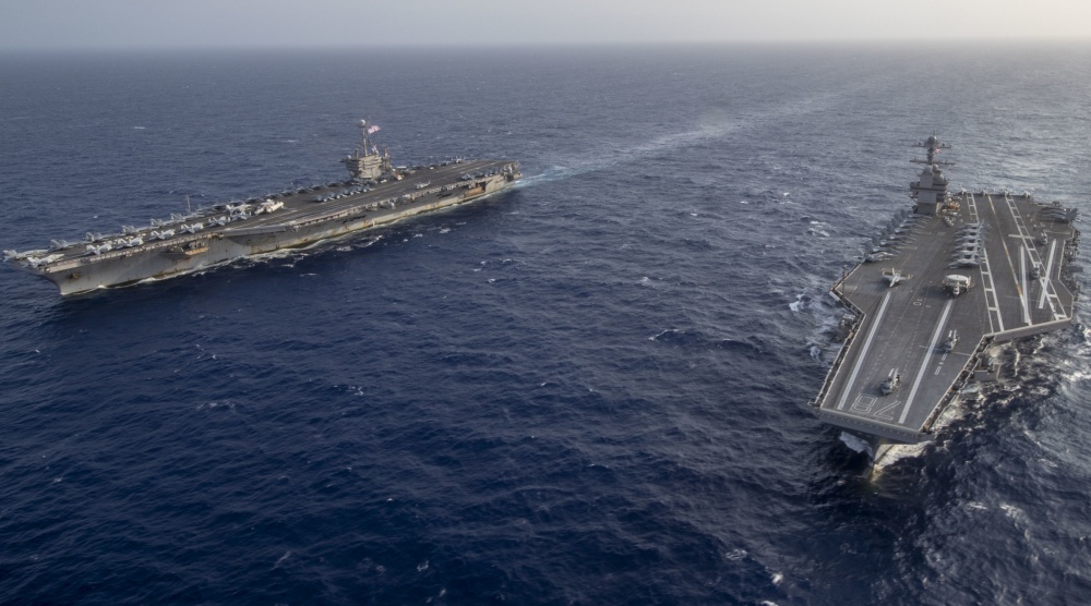 These photos of USS Gerald R. Ford and USS Harry S. Truman operating together highlight the differences between a Ford-class and a Nimitz-class aircraft carrier