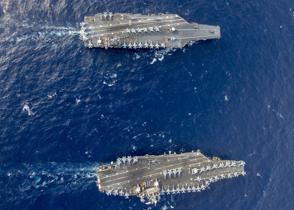 These photos of USS Gerald R. Ford and USS Harry S. Truman operating together highlight the differences between a Ford-class and a Nimitz-class aircraft carrier