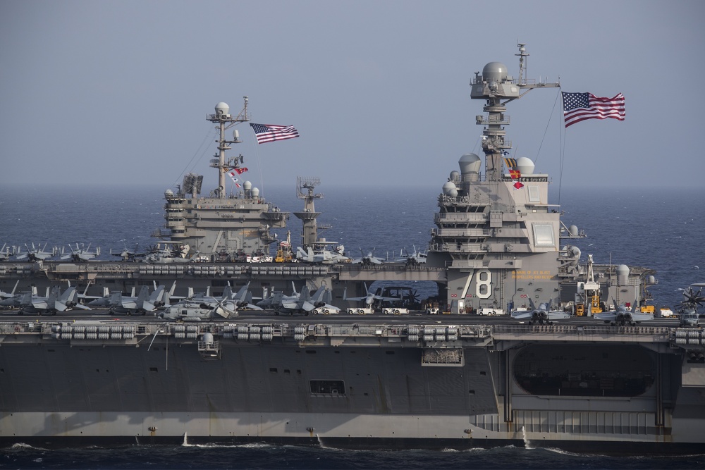 These photos of USS Gerald R. Ford and USS Harry S. Truman operating together highlight the differences between a Ford-class and a Nimitz-class aircraft carrier