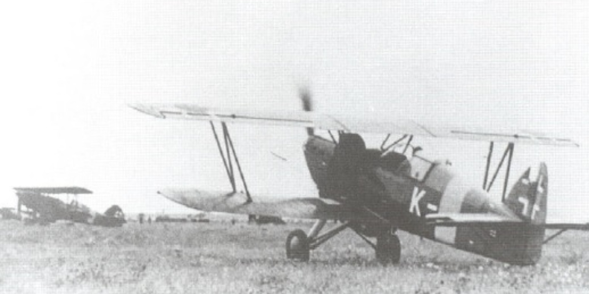 During WWII a Slovak Air Force’s biplane pilot rescued a downed fellow pilot by carrying him on the bottom wing of his aircraft