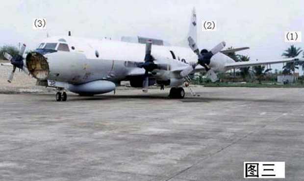 Chinese Marine Corps releases photo of a group of marines in front of a dismantled US Navy EP-3 Aries II on 20th anniversary of the Hainan Incident