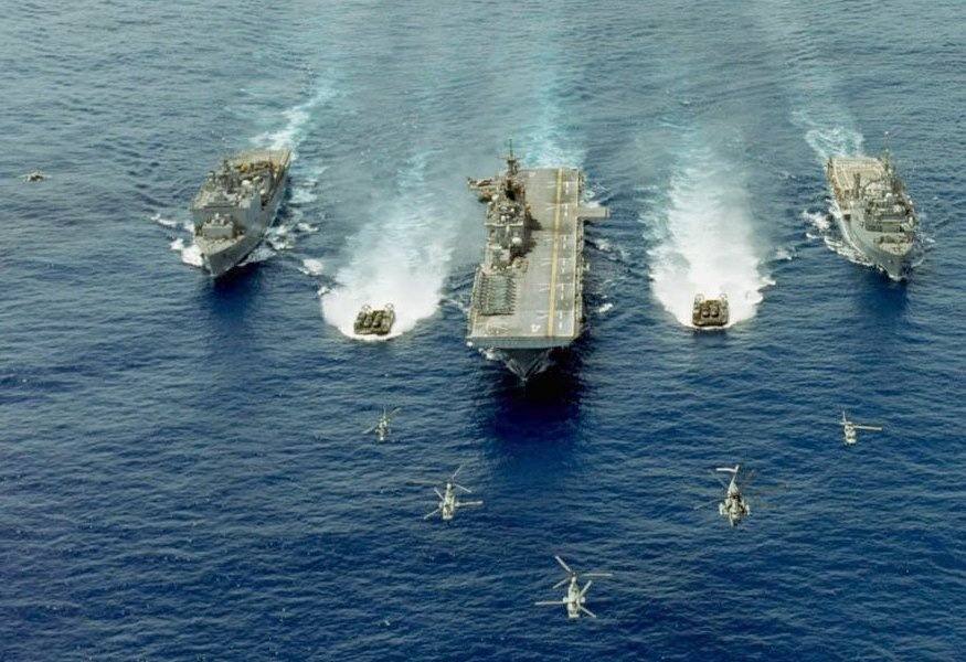 Tactical Action Officer on a US Navy aircraft carrier tells how long does it take to a Nimitz Class aircraft carrier to go to flank speed