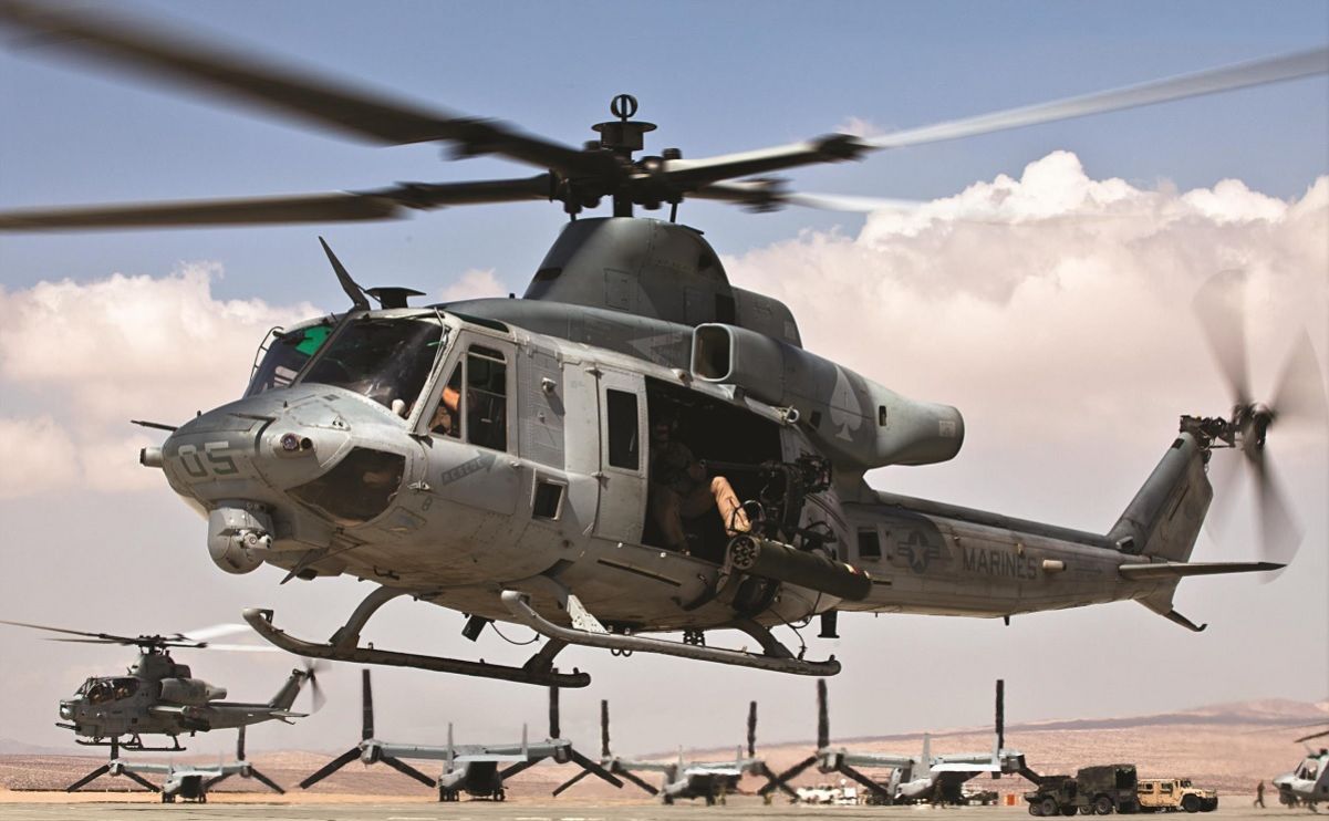 The USMC deems upgraded versions of the AH-1 Cobra more capable than the AH-64 Apache. Here’s why.
