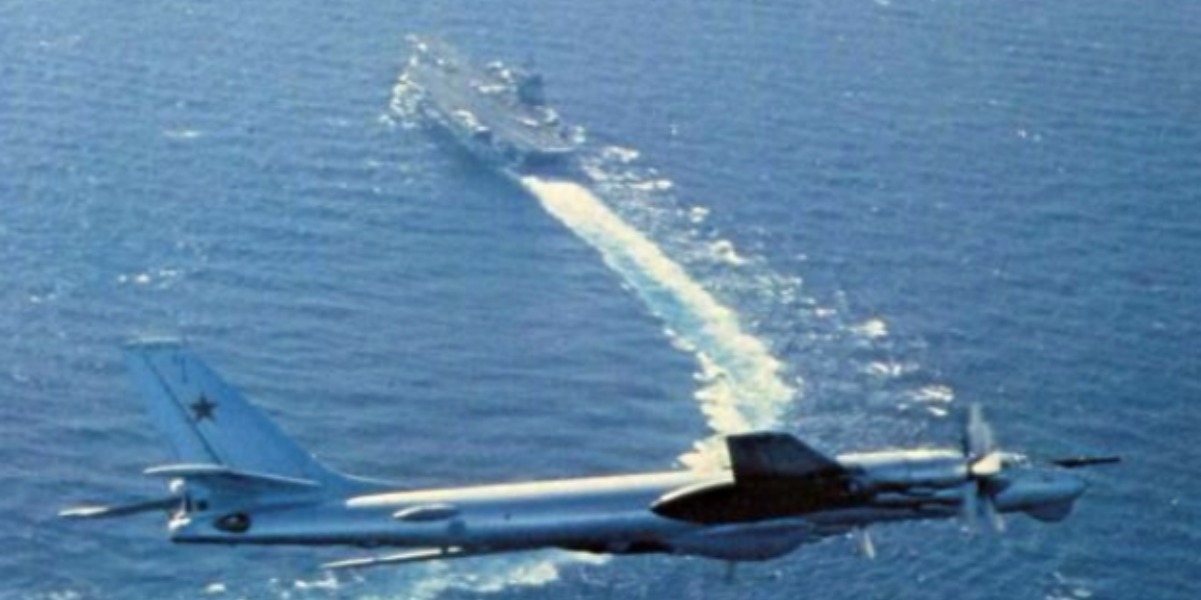 Naval Aviator recalls when his aircraft carrier detected two Soviet Tu-95 bombers because their crews were sloppy in radio usage (the Bear were intercepted by F-4s at 250 miles from the battle group)