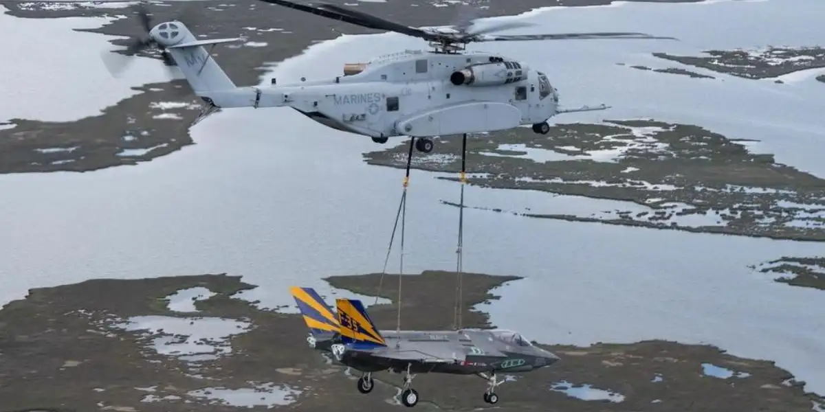 USMC CH-53K refuels from KC-130 while transporting F-35 between test sites